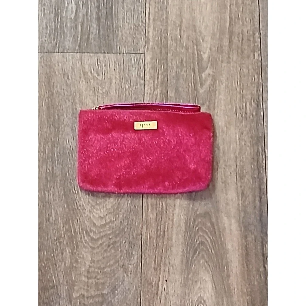 Pink fuzzy Ipsy cosmetic bag